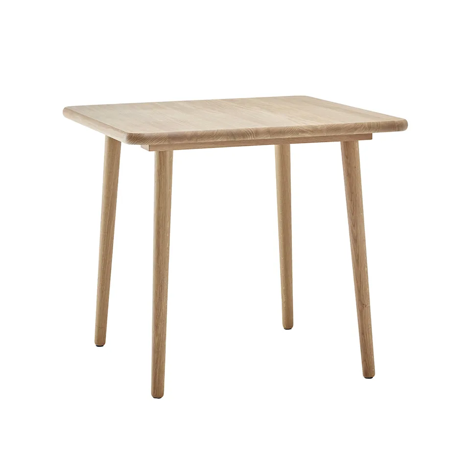 Miss Tailor oak dining table