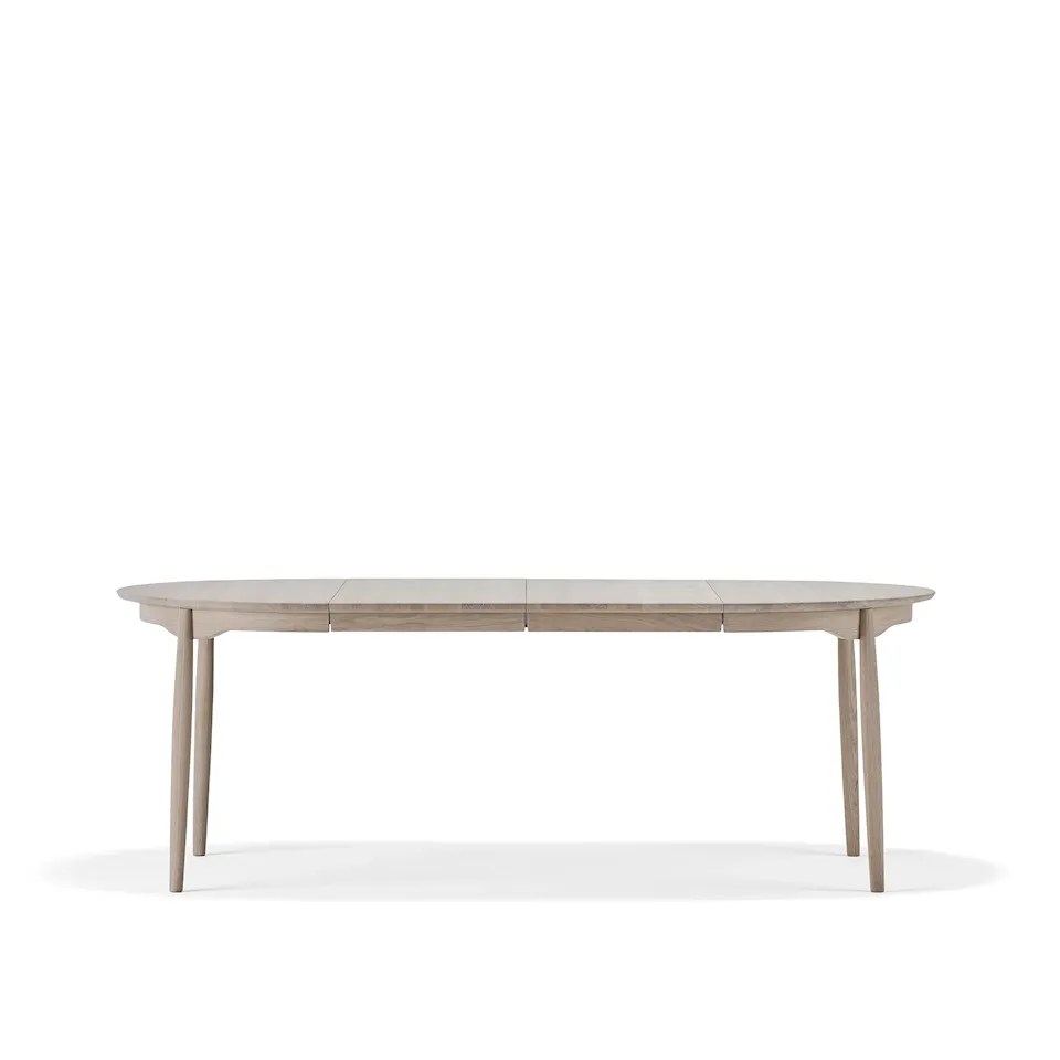 Carl dining table Ø115 cm with extension leaf